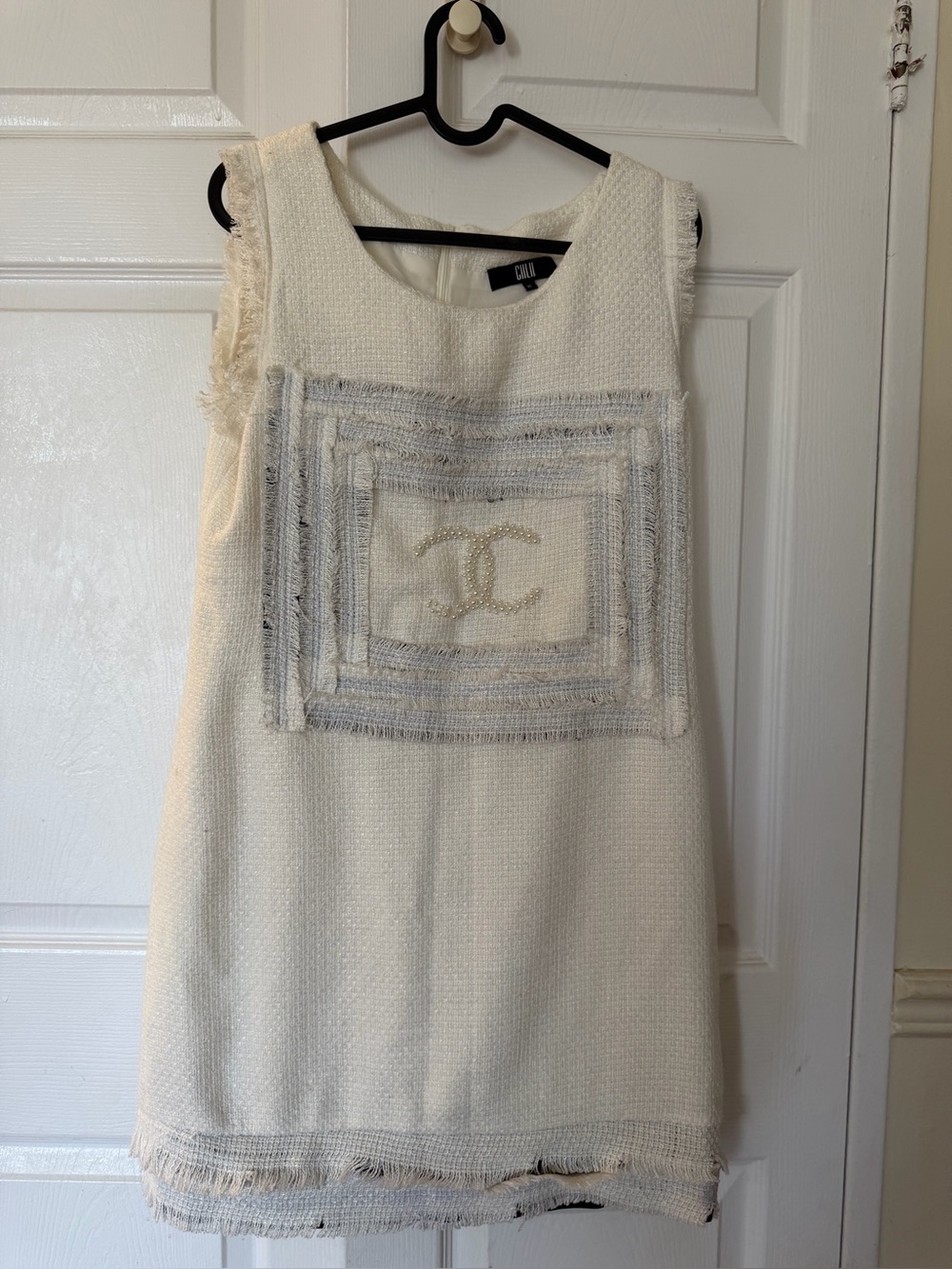 Ivory Sleeveless Tweed Shift Dress with Embroidered Logo Detail